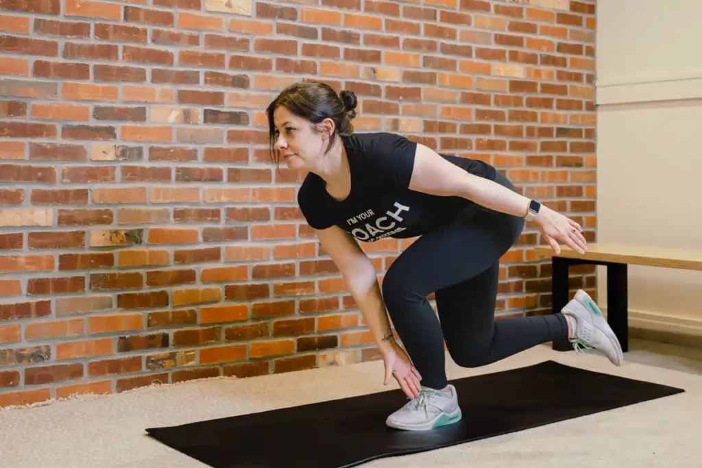 A person exercising their arms at home with light weights Wentworth
