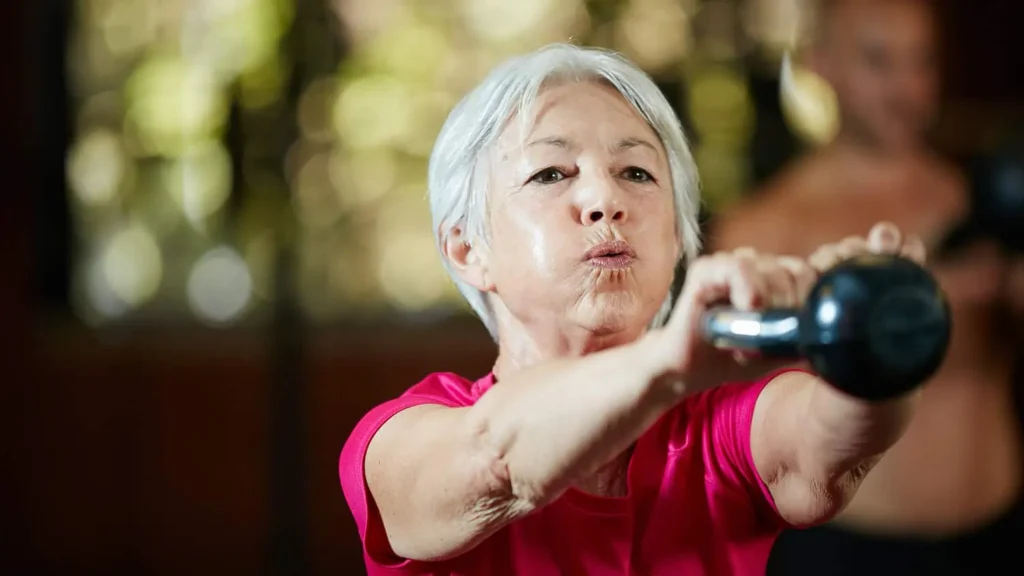 Woman doing resistance band exercises for toned arms Wentworth