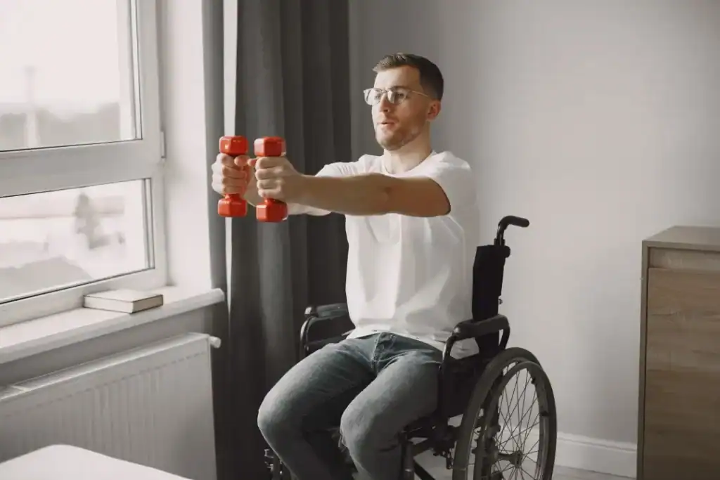 Image of man doing exercise in his wheelchair to aid weight loss Wentworth