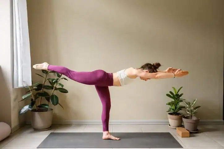 Achieving the Perfect Tone: How Often Should You Exercise for Results? 1 Woman doing Yoga exercise Wentworth to help with toning the body.